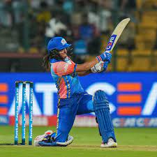 "Harmanpreet Kaur's Masterclass Propels Mumbai Indians into WPL Playoffs"